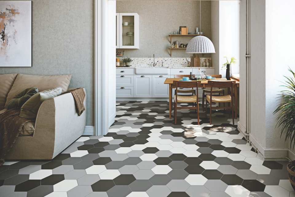 black, white, and gray hexagon tiles in contemporary living room leading into kitchen